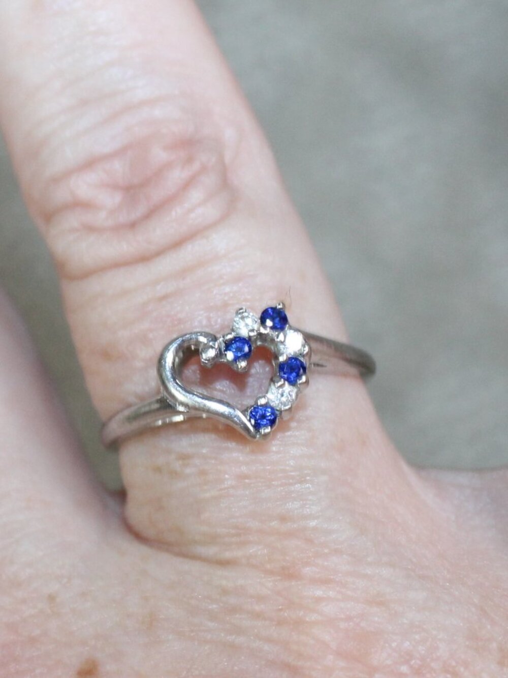 1.49g 10k White Gold Ring with Blue Sapphire and Cubic Zirconia (Size 7)